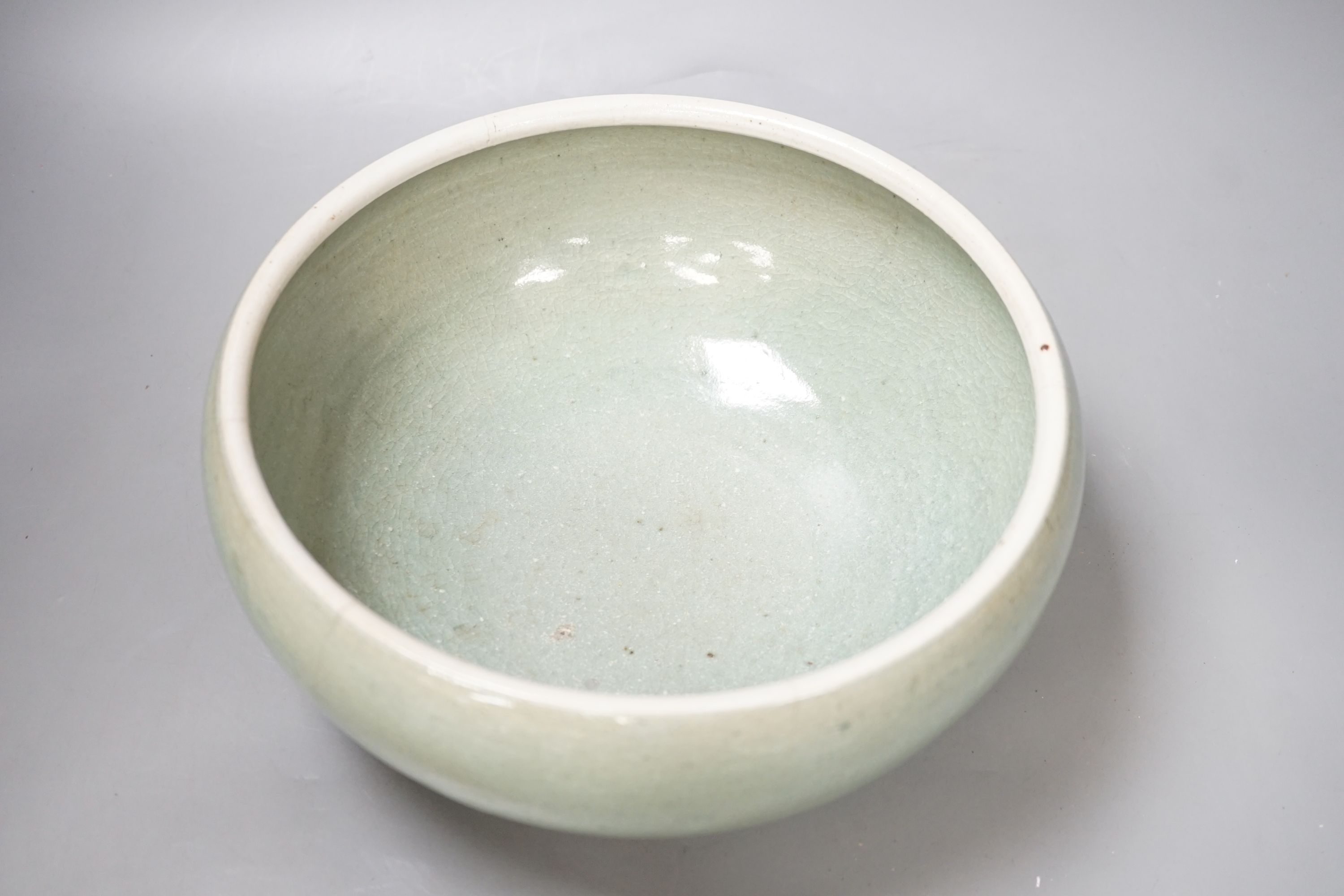 A Chinese celadon crackle glaze Guan type bowl - diameter 27cm